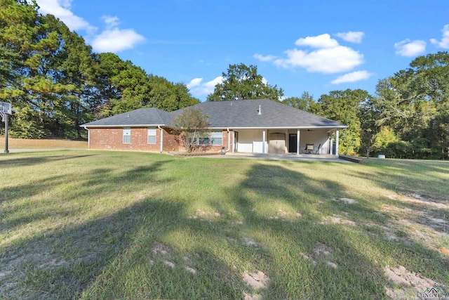 exterior space with a yard