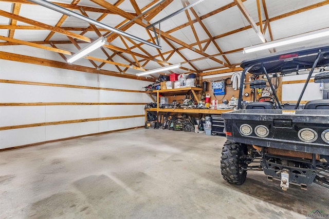 garage with a workshop area