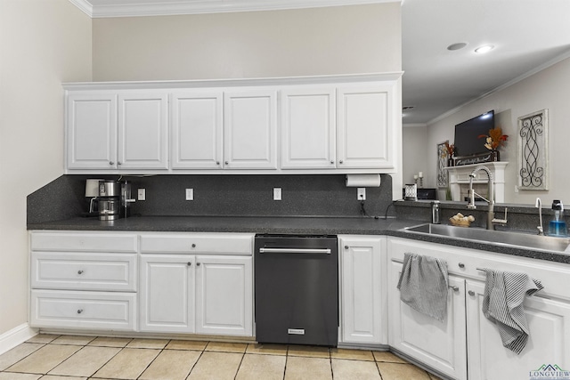 kitchen with sink, decorative backsplash, ornamental molding, light tile patterned flooring, and white cabinetry