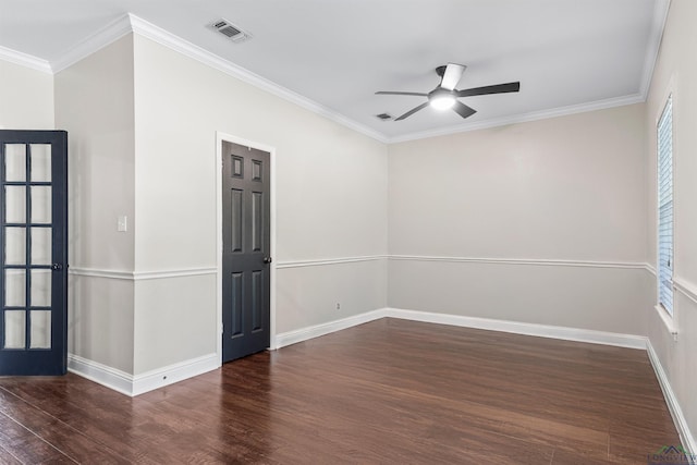 empty room featuring ceiling fan, dark hardwood / wood-style flooring, crown molding, and french doors