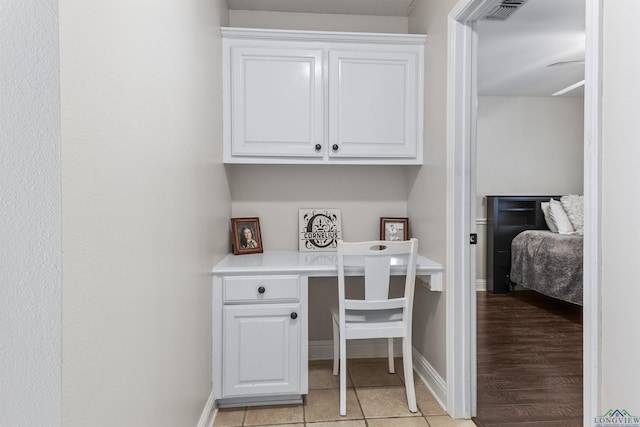 tiled office with built in desk