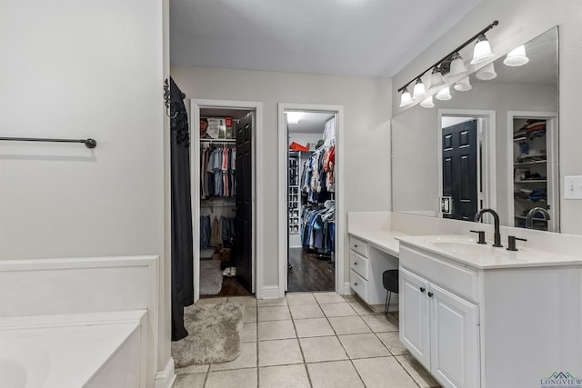 bathroom with vanity and tile patterned floors