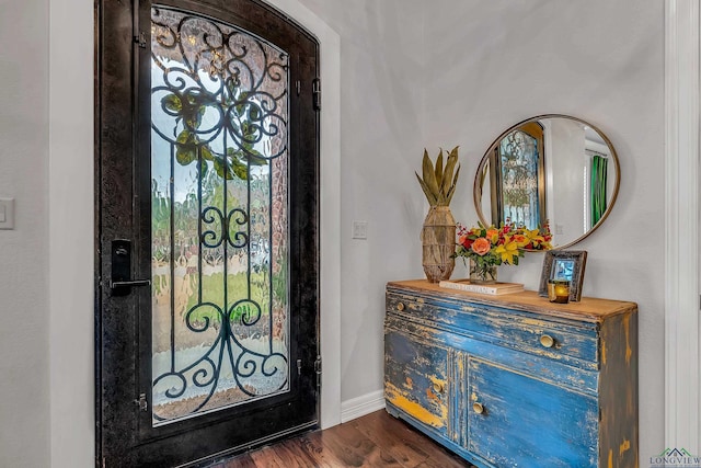 foyer featuring dark hardwood / wood-style floors