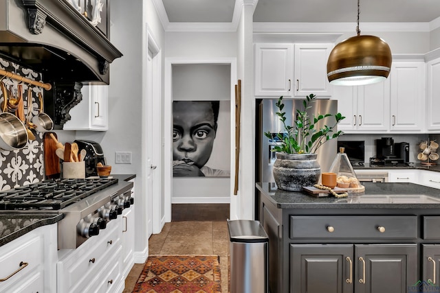 kitchen featuring gray cabinets, white cabinetry, stainless steel appliances, and range hood