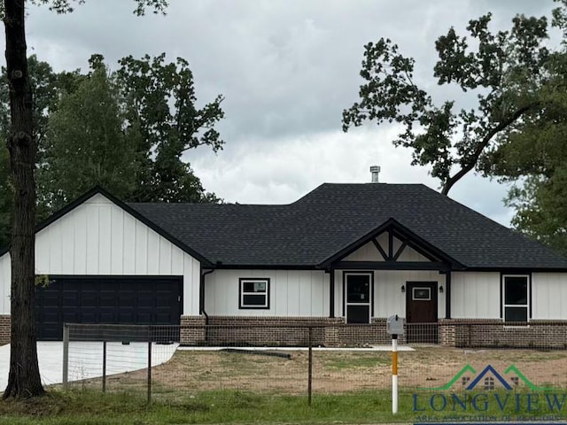 1969 State Highway 149, Carthage, TX 75633 - view of front of house featuring brick siding and roof with shingles