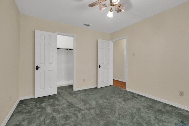 490 Southfield Ln, Marshall, TX 75672 - unfurnished bedroom featuring dark carpet, baseboards, and a closet