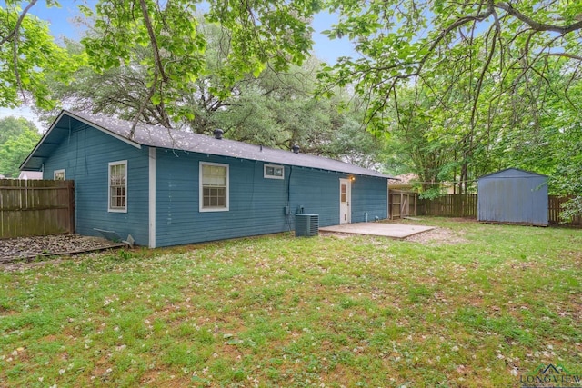 204 Half St, Lindale, TX 75771 - back of property with a patio area and cooling unit