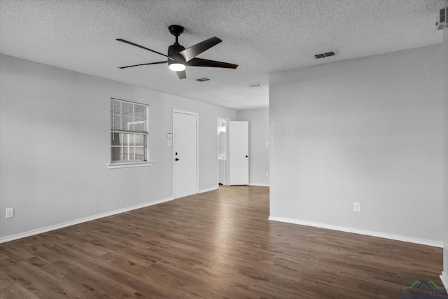 204 Half St, Lindale, TX 75771 - empty room with ceiling fan, wood finished floors, a textured ceiling, and baseboards