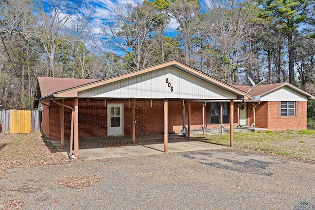 view of front of home featuring a carport