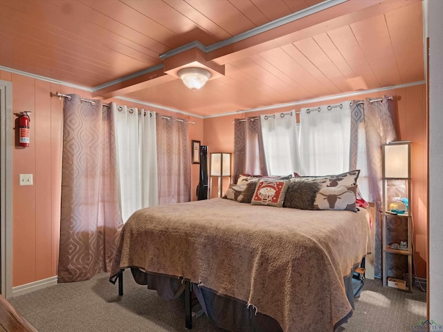 carpeted bedroom with ornamental molding