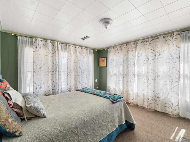 bedroom featuring carpet