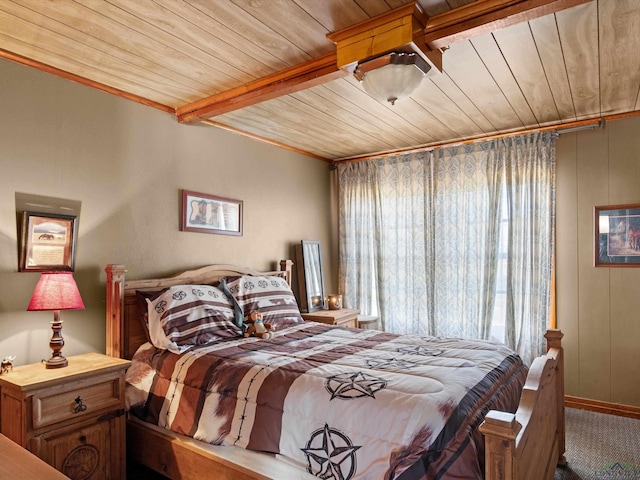 carpeted bedroom with beam ceiling and wood ceiling