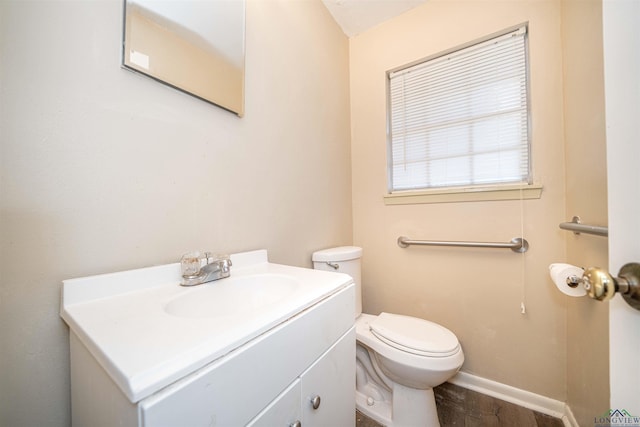 207 E Eleanor St, Gladewater, TX 75647 - bathroom with vanity and wood finished floors