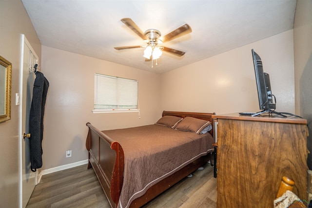 207 E Eleanor St, Gladewater, TX 75647 - bedroom with wood finished floors and a ceiling fan