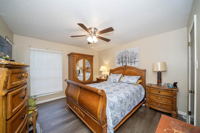 207 E Eleanor St, Gladewater, TX 75647 - bedroom featuring dark wood finished floors and a ceiling fan
