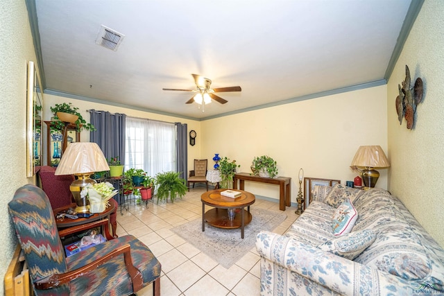 207 E Eleanor St, Gladewater, TX 75647 - living room featuring light tile patterned floors, a ceiling fan, and ornamental molding