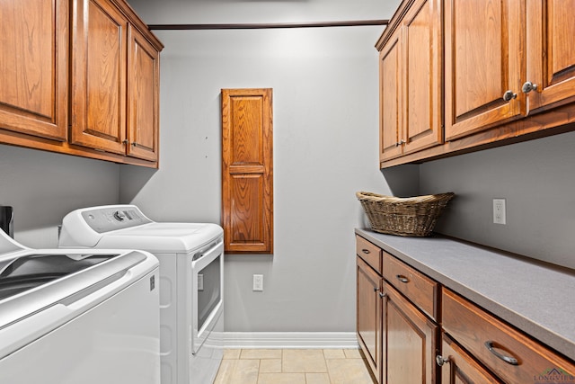 1844 Raven Rd, Diana, TX 75640 - washroom featuring washer and clothes dryer, cabinet space, and baseboards