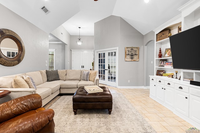 1844 Raven Rd, Diana, TX 75640 - living area with built in shelves, baseboards, and high vaulted ceiling