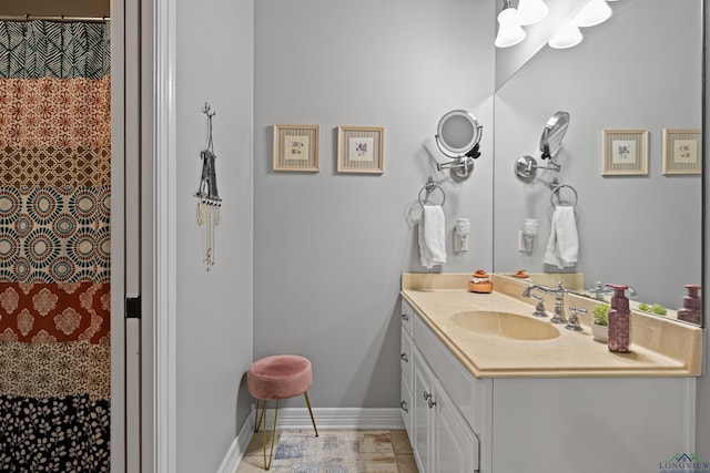 1844 Raven Rd, Diana, TX 75640 - full bathroom featuring vanity and baseboards