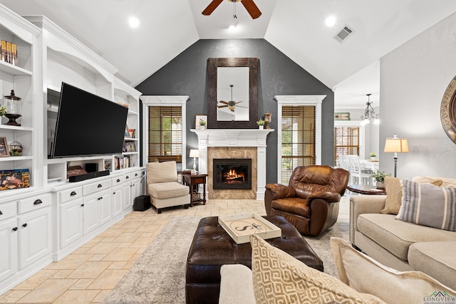 1844 Raven Rd, Diana, TX 75640 - living room featuring ceiling fan, stone tile flooring, lofted ceiling, a premium fireplace, and recessed lighting