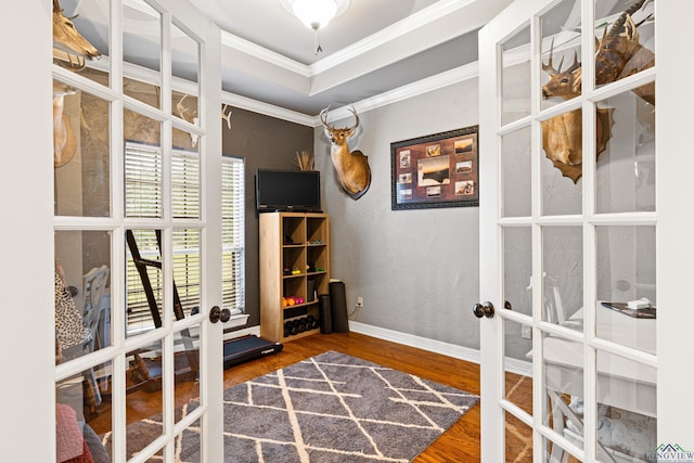 1844 Raven Rd, Diana, TX 75640 - office area with french doors, ornamental molding, wood finished floors, and baseboards