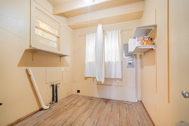 laundry room featuring light hardwood / wood-style flooring