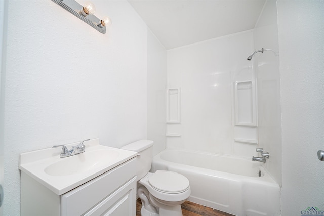 full bathroom with shower / tub combination, vanity, and toilet