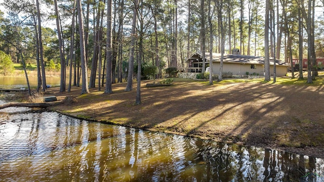 exterior space with a water view