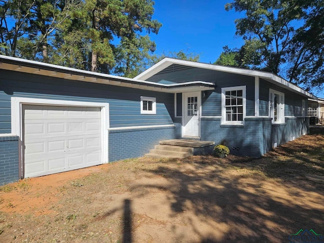 ranch-style house with a garage