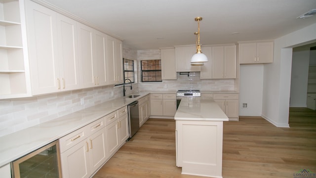 kitchen featuring open shelves, a sink, beverage cooler, stainless steel appliances, and a kitchen island