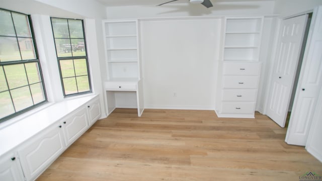 unfurnished bedroom with light wood-style floors and baseboards