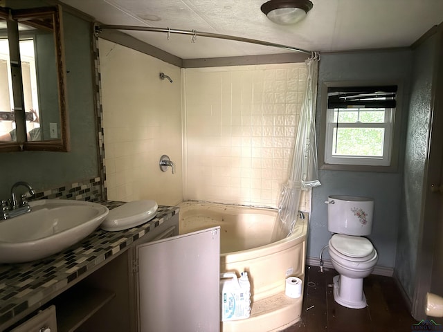 4604 Skyline Dr, Chandler, TX 75758 - bathroom featuring shower / bath combination with curtain, toilet, and vanity