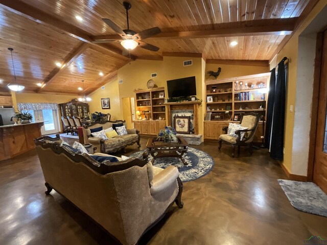 living room featuring wooden ceiling, ceiling fan with notable chandelier, vaulted ceiling with beams, built in features, and a fireplace