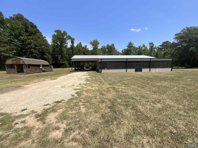 exterior space with a yard