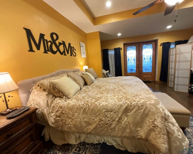 bedroom with ceiling fan and french doors