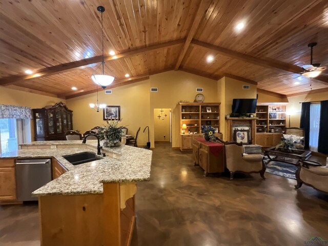 kitchen with dishwasher, sink, vaulted ceiling with beams, light stone counters, and decorative light fixtures