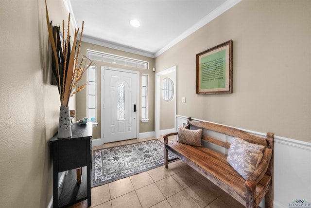 tiled entryway with ornamental molding