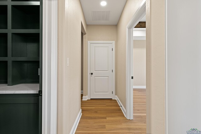 169 Andres Ln, Kilgore, TX 75662 - corridor featuring light wood finished floors, baseboards, visible vents, and recessed lighting
