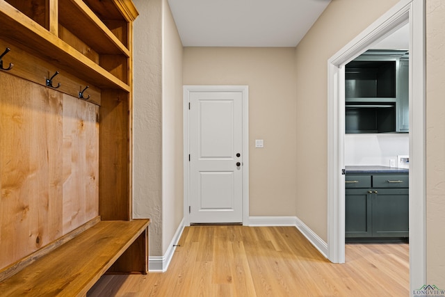 169 Andres Ln, Kilgore, TX 75662 - mudroom featuring baseboards and light wood-style floors