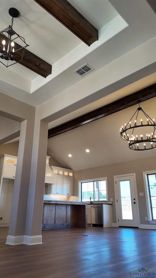 kitchen with dishwasher, white cabinetry, visible vents, and a notable chandelier