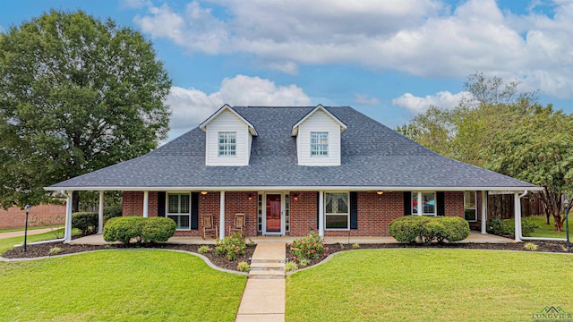 view of front of home featuring a front lawn and a porch