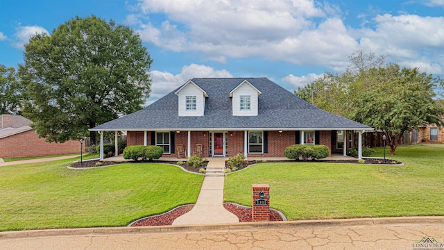 view of front of home with a front lawn and covered porch