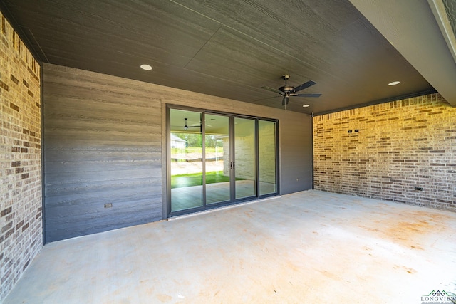 view of patio featuring ceiling fan