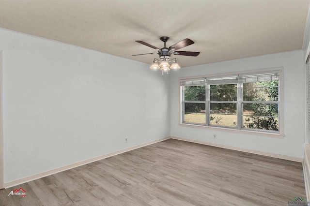 unfurnished room with ceiling fan and light hardwood / wood-style flooring