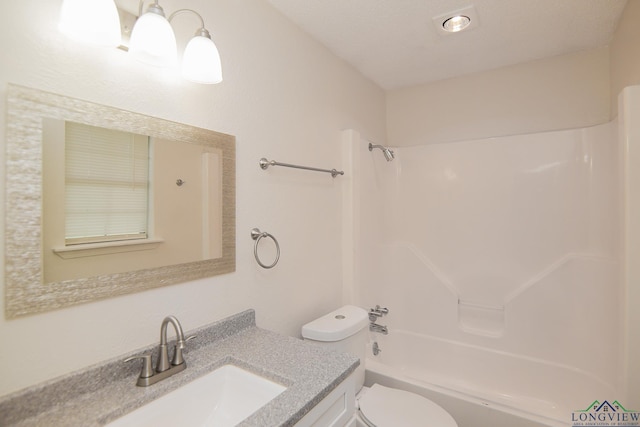 full bath featuring vanity,  shower combination, and toilet