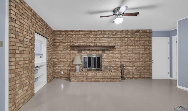 unfurnished living room with baseboards, a ceiling fan, brick wall, a textured ceiling, and a fireplace