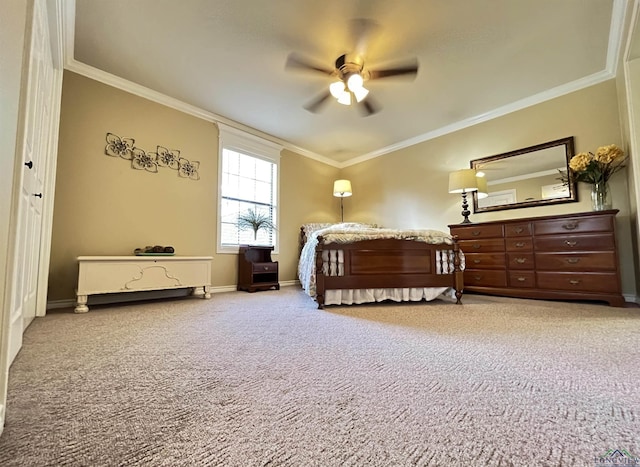 bedroom featuring carpet, a closet, ceiling fan, and crown molding