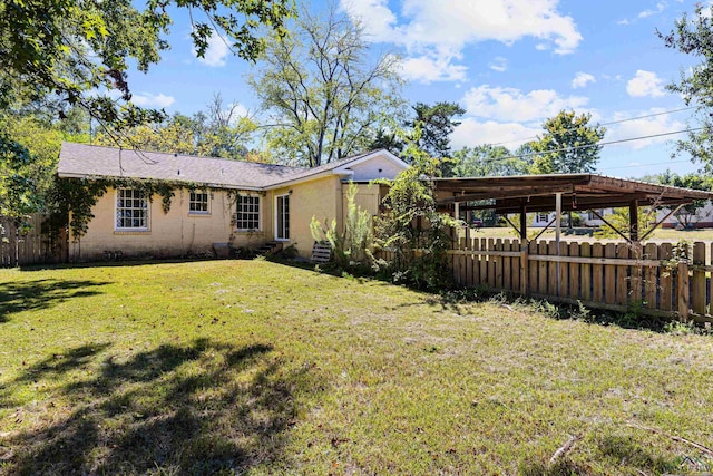 view of yard featuring a carport