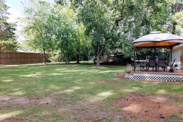 view of yard with a gazebo and a deck