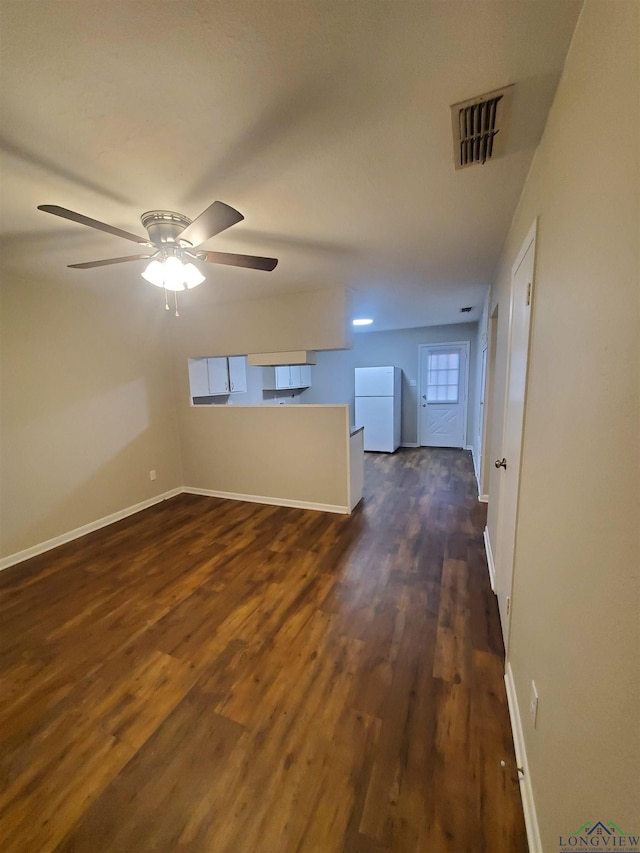 interior space featuring dark hardwood / wood-style floors and ceiling fan